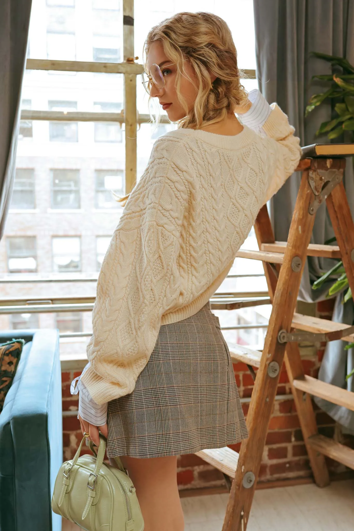 CONTRAST SLEEVE CABLE KNIT SWEATER