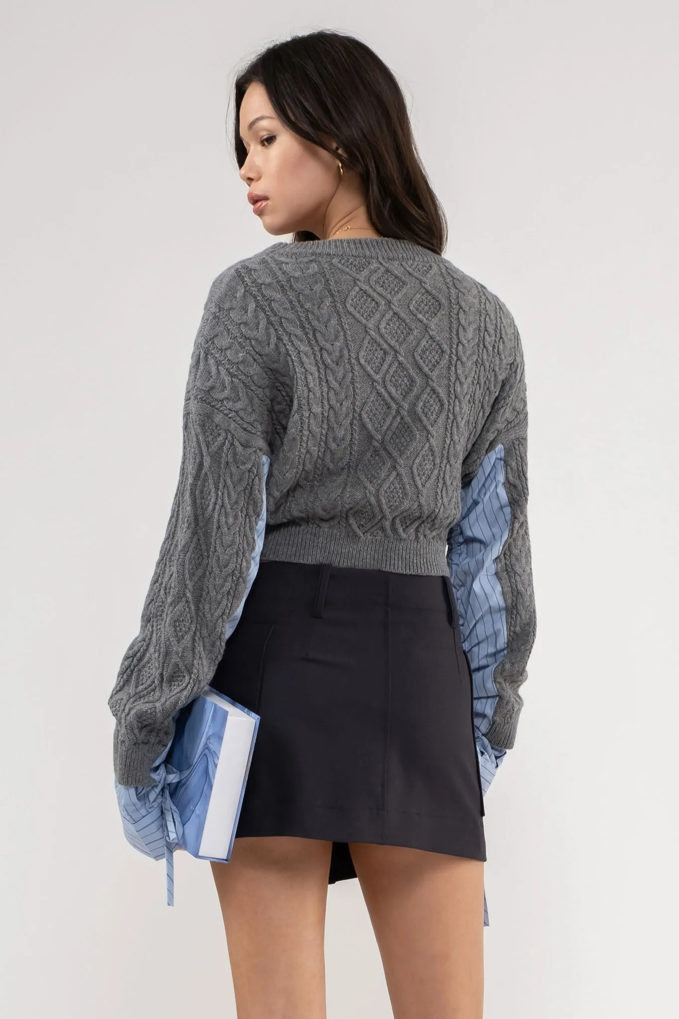 CONTRAST SLEEVE CABLE KNIT SWEATER