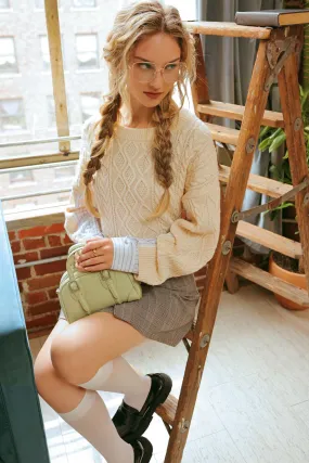 CONTRAST SLEEVE CABLE KNIT SWEATER